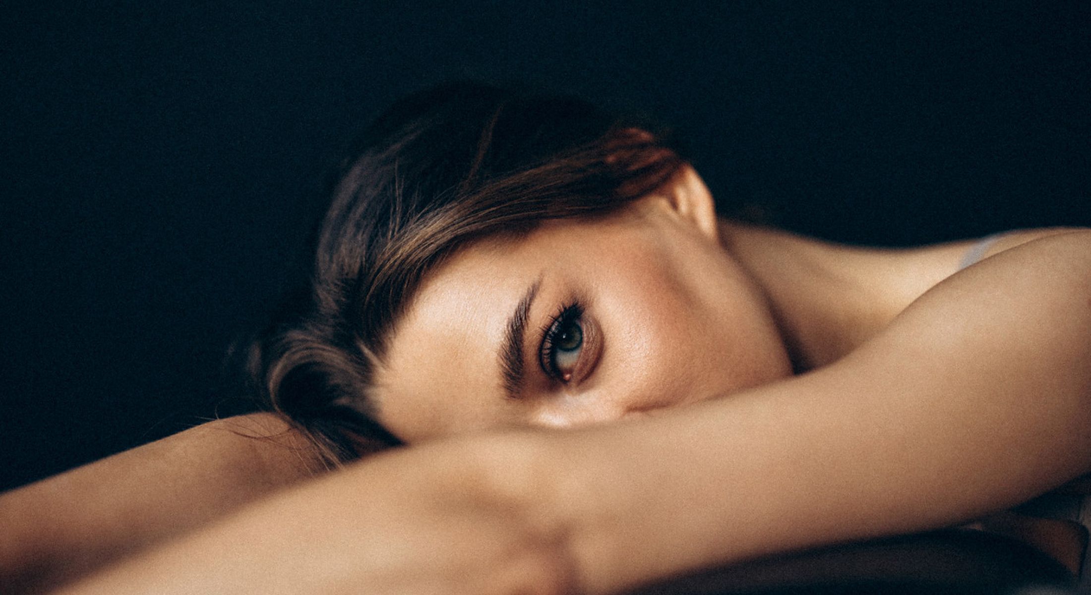 Skincare products displayed on shelves and countertop.